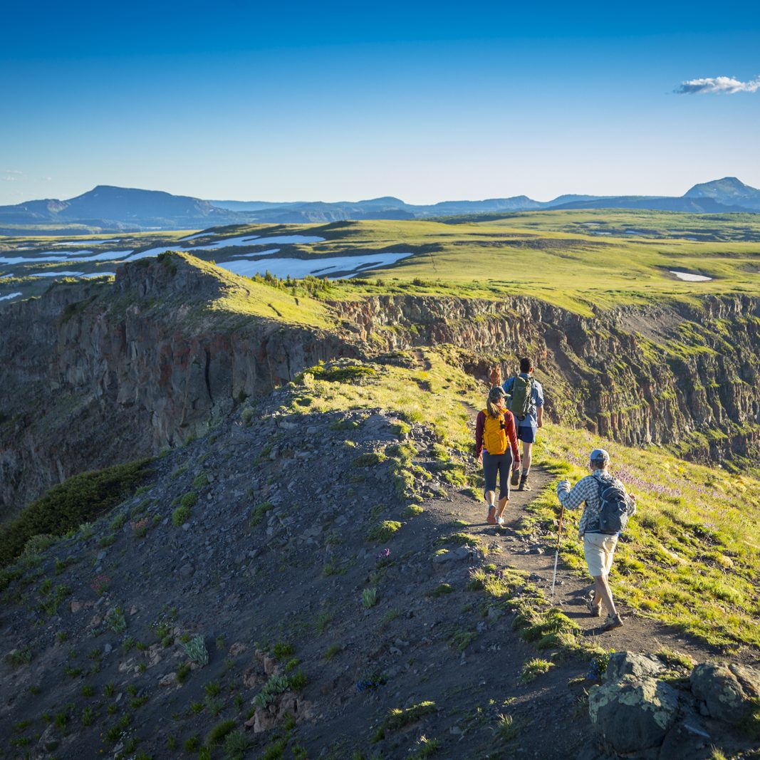 Family Hiking on the top ridge of Colorado Mountains